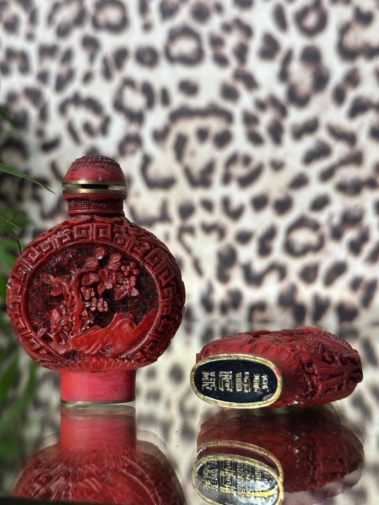 Pair of Cinnabar Snuff Bottles